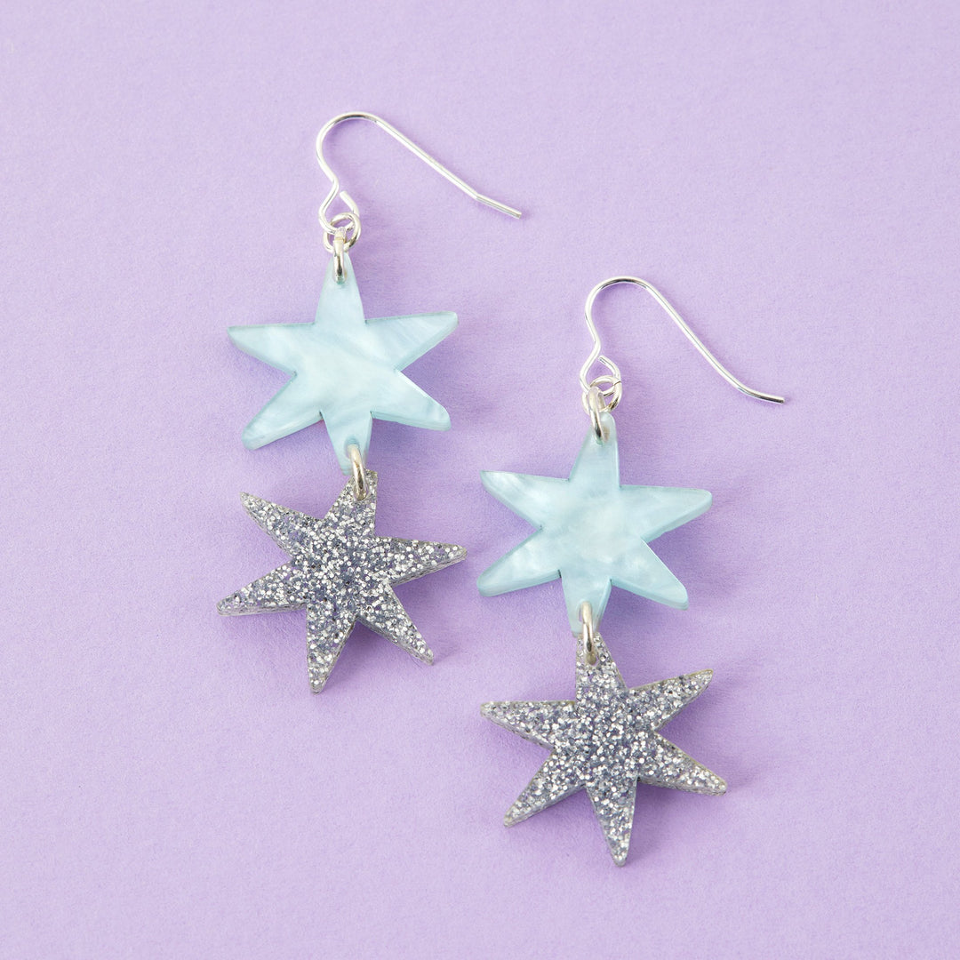 Star Dangle Earrings in Silver Glitter